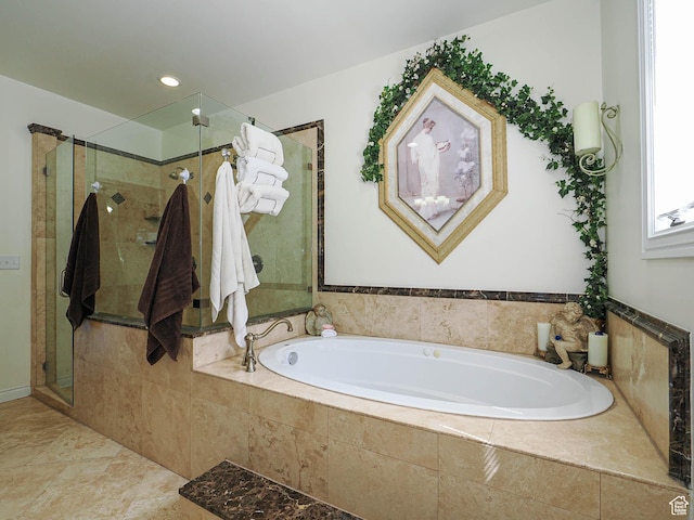 bathroom featuring a garden tub, a stall shower, and recessed lighting