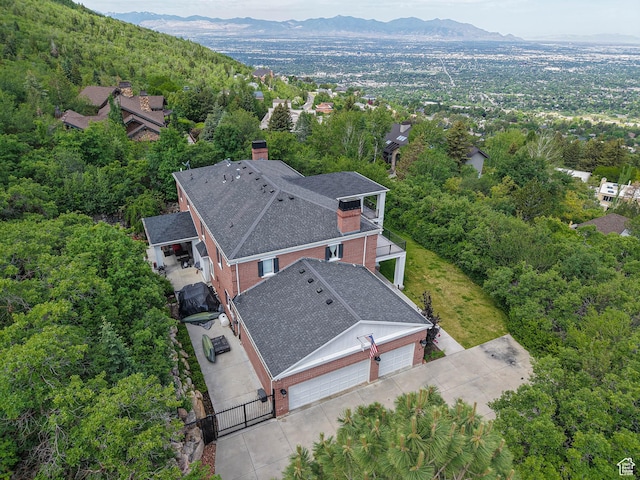4545 S Abinadi Rd, Salt Lake City, UT 84124 - aerial view of property and surrounding area with a heavily wooded area and a mountain backdrop