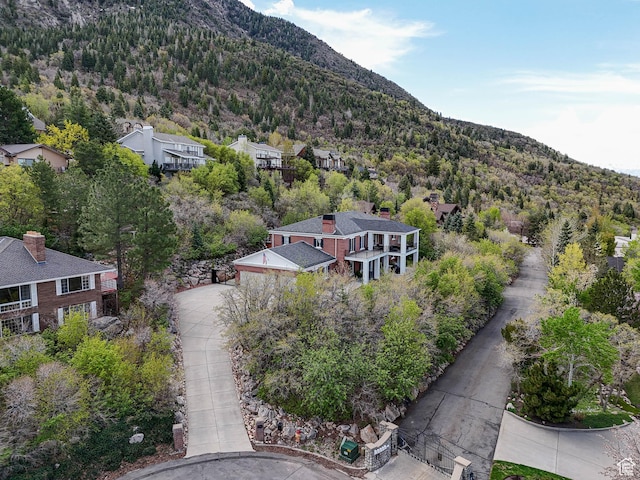 birds eye view of property with a residential view and a mountain view