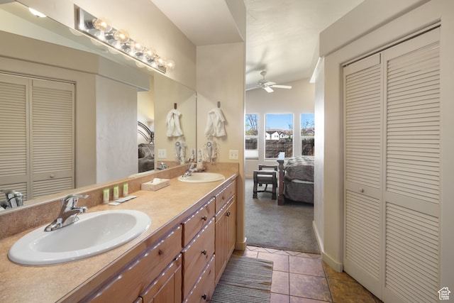 3686 S Spanish Valley Dr Unit W-4, Moab, UT 84532 - ensuite bathroom featuring a sink, tile patterned floors, ceiling fan, and a closet
