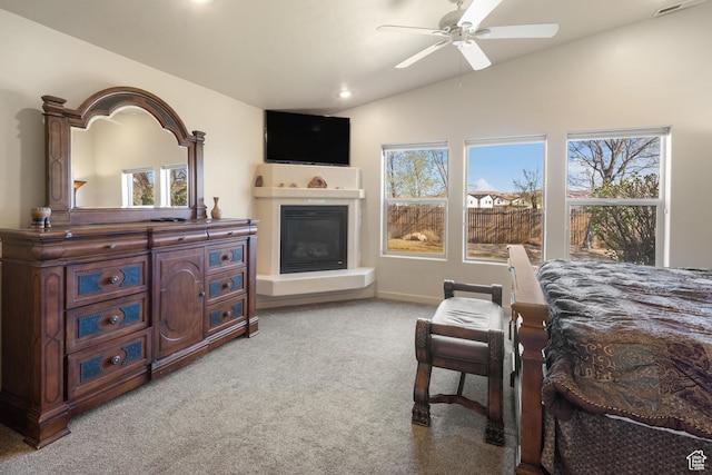 3686 S Spanish Valley Dr Unit W-4, Moab, UT 84532 - carpeted bedroom with baseboards, a glass covered fireplace, lofted ceiling, and multiple windows