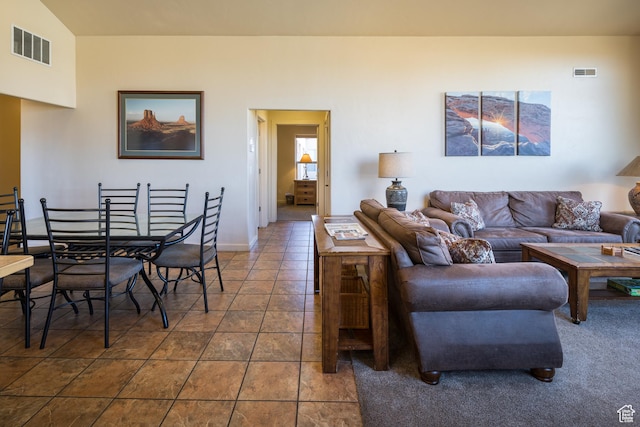 3686 S Spanish Valley Dr Unit W-4, Moab, UT 84532 - living area with dark tile patterned floors, baseboards, and visible vents