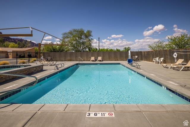 3686 S Spanish Valley Dr Unit W-4, Moab, UT 84532 - community pool with a patio and fence