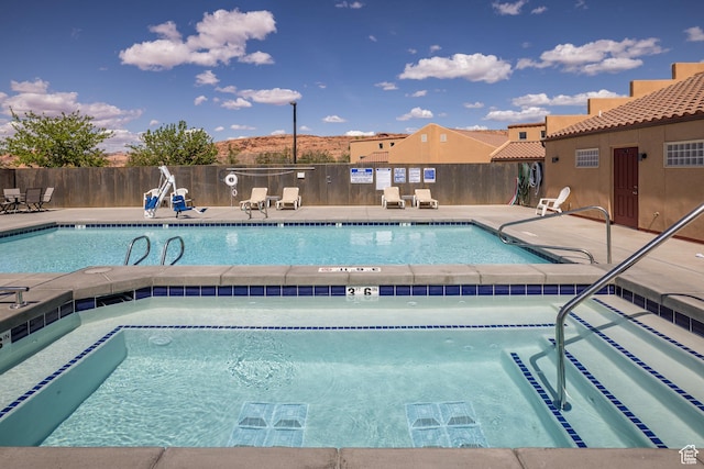 3686 S Spanish Valley Dr Unit W-4, Moab, UT 84532 - community pool featuring a patio, a community hot tub, and fence