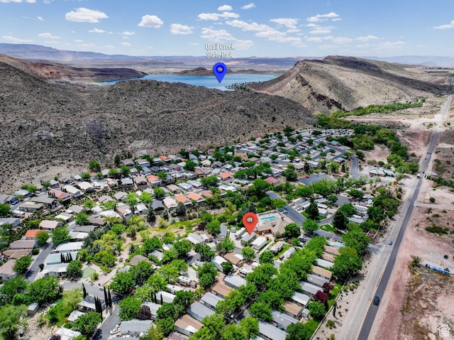 54 Cottonwood Ln, Hurricane, UT 84737 - drone / aerial view with a residential view and a water and mountain view