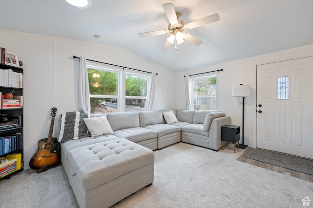 54 Cottonwood Ln, Hurricane, UT 84737 - living area with a ceiling fan, vaulted ceiling, and light colored carpet