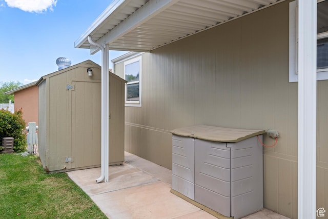 54 Cottonwood Ln, Hurricane, UT 84737 - view of patio / terrace with a storage shed and an outbuilding