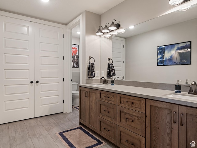 641 W 500 S, Midway, UT 84049 - full bathroom featuring toilet and double vanity