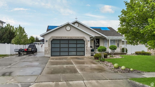 5394 W Shaggy Peak Dr, Riverton, UT 84096 - view of front of property featuring stucco siding, fence, a garage, driveway, and a front yard