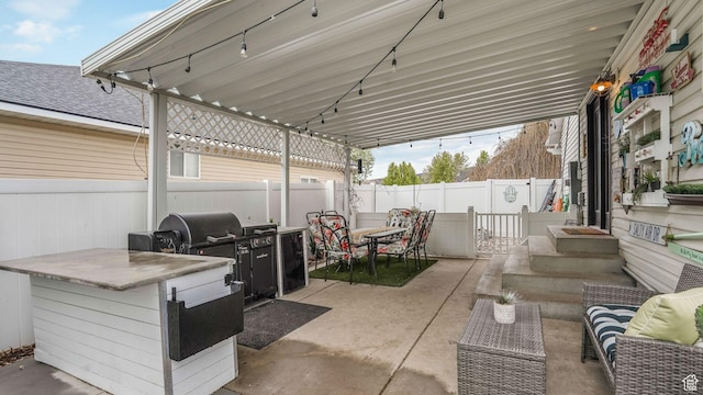 5394 W Shaggy Peak Dr, Riverton, UT 84096 - view of patio featuring outdoor dining space, an outdoor hangout area, and a fenced backyard