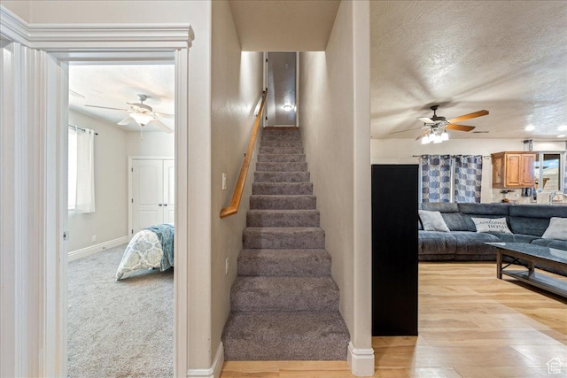388 E 1060 S, Ivins, UT 84738 - stairs with baseboards, wood finished floors, and a ceiling fan