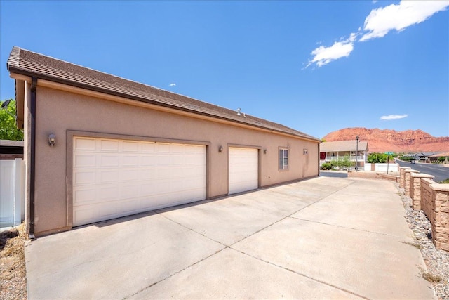 388 E 1060 S, Ivins, UT 84738 - garage featuring a mountain view