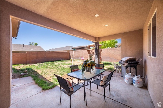 388 E 1060 S, Ivins, UT 84738 - view of patio / terrace with a grill, outdoor dining area, and a fenced backyard