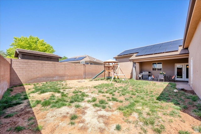 388 E 1060 S, Ivins, UT 84738 - view of yard featuring a patio, french doors, a playground, and a fenced backyard