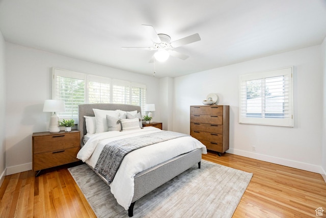 1151 E Chevy Chase Dr, Murray, UT 84117 - bedroom with ceiling fan, light wood-type flooring, and baseboards