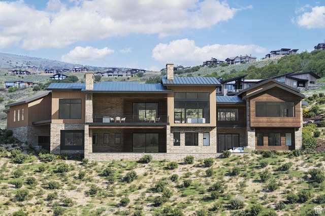 2177 E Notch Cir Unit 354, Heber City, UT 84032 - back of house featuring a chimney, stone siding, and a standing seam roof
