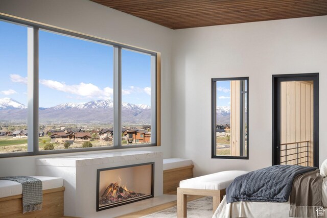 2177 E Notch Cir Unit 354, Heber City, UT 84032 - bedroom featuring multiple windows, a mountain view, and wooden ceiling