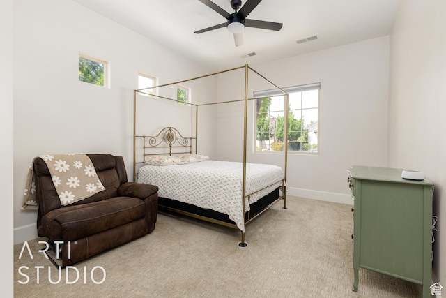 309 W Blue Quartz Dr, Washington, UT 84780 - bedroom featuring light colored carpet, visible vents, baseboards, and multiple windows