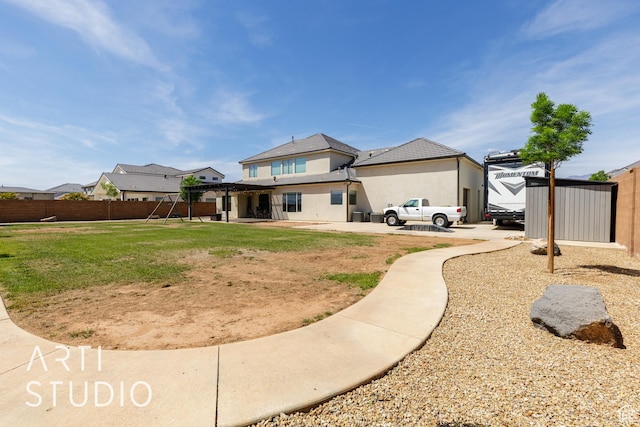 309 W Blue Quartz Dr, Washington, UT 84780 - back of house with fence, a yard, and a patio area