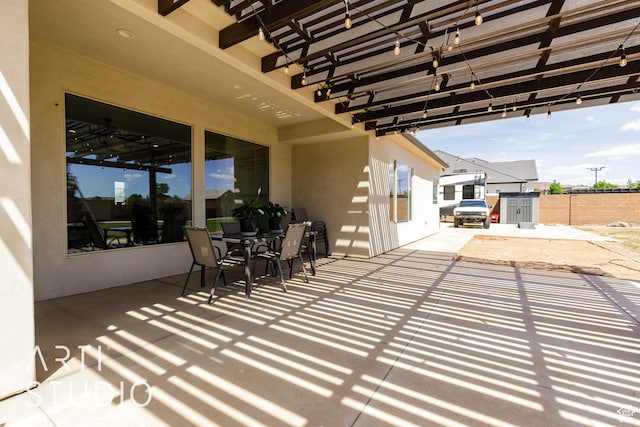 309 W Blue Quartz Dr, Washington, UT 84780 - view of patio / terrace with fence, outdoor dining space, and a pergola