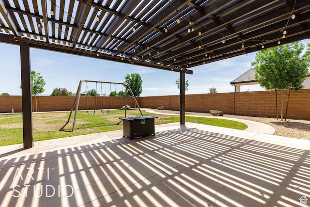309 W Blue Quartz Dr, Washington, UT 84780 - view of patio featuring a pergola, a playground, and a fenced backyard
