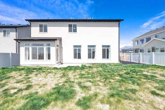315 W 910 S, American Fork, UT 84003 - back of property featuring a yard, stucco siding, and a fenced backyard