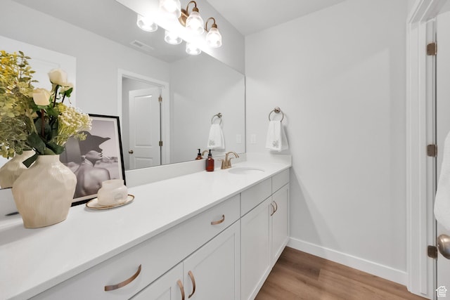 315 W 910 S, American Fork, UT 84003 - bathroom with baseboards, visible vents, wood finished floors, and vanity