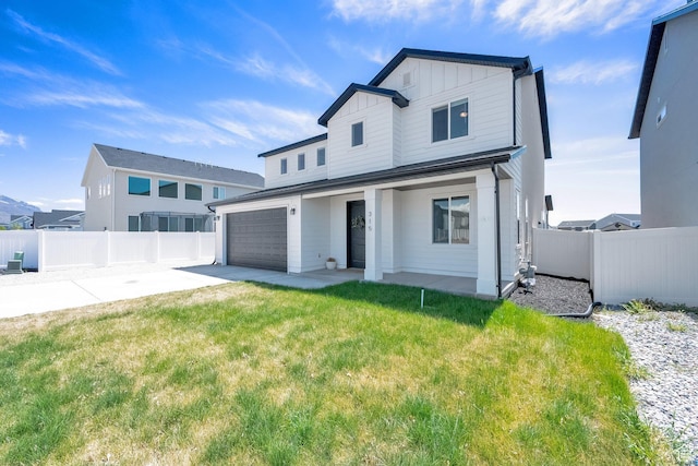 315 W 910 S, American Fork, UT 84003 - traditional-style house with fence, concrete driveway, a front lawn, and a garage