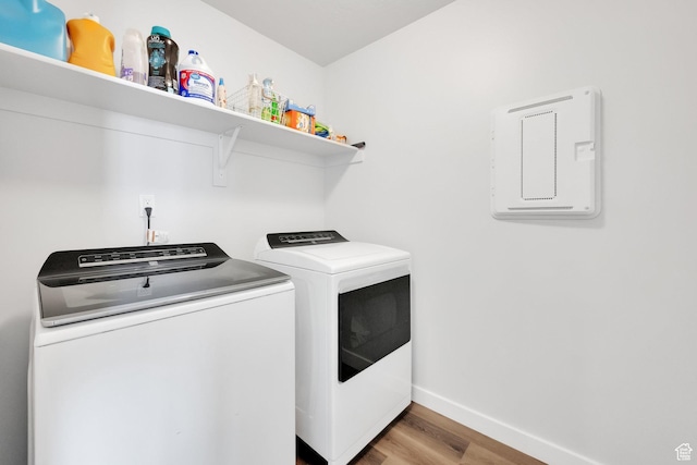 315 W 910 S, American Fork, UT 84003 - laundry room with baseboards, separate washer and dryer, laundry area, and light wood finished floors