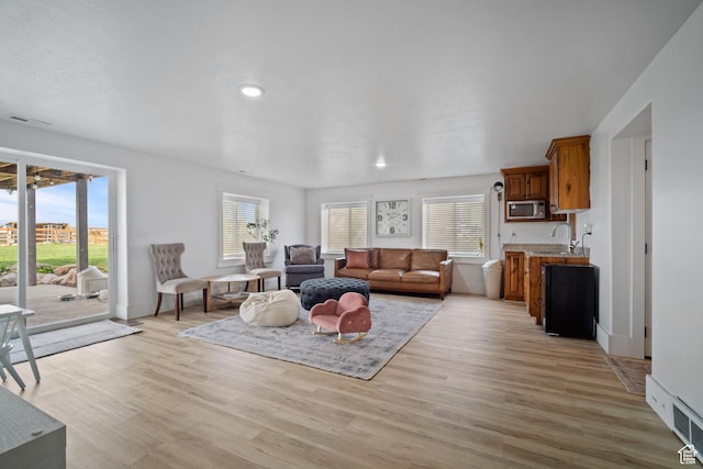 9457 N 4800 W, Elwood, UT 84337 - living area with visible vents, recessed lighting, and light wood-style flooring