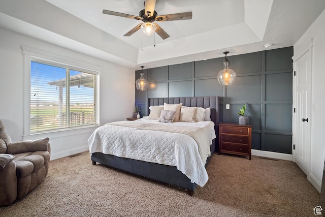 9457 N 4800 W, Elwood, UT 84337 - bedroom with a raised ceiling, visible vents, baseboards, carpet, and a decorative wall
