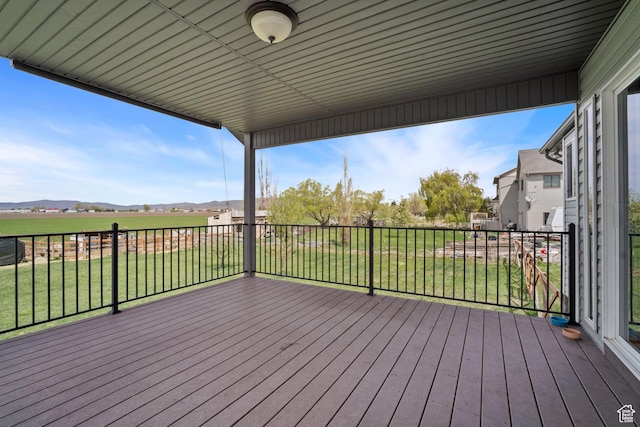9457 N 4800 W, Elwood, UT 84337 - wooden deck featuring a mountain view and a yard