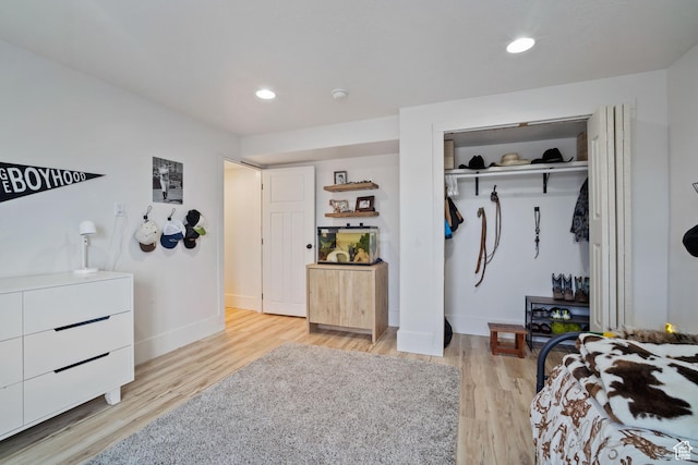 9457 N 4800 W, Elwood, UT 84337 - bedroom featuring wood finished floors, a closet, recessed lighting, and baseboards