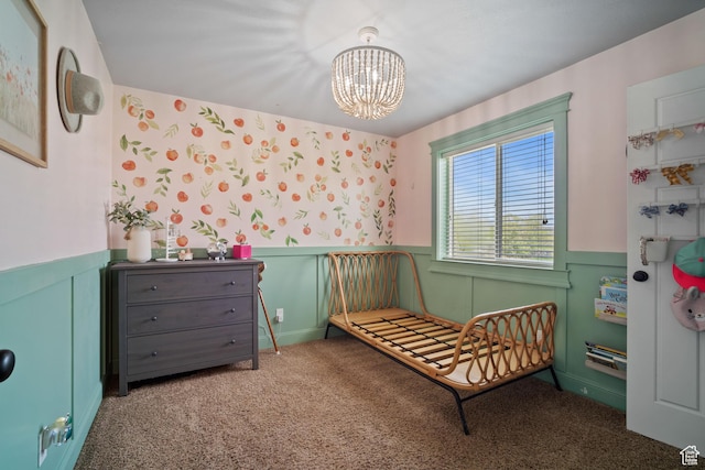 9457 N 4800 W, Elwood, UT 84337 - carpeted bedroom featuring wainscoting and a chandelier