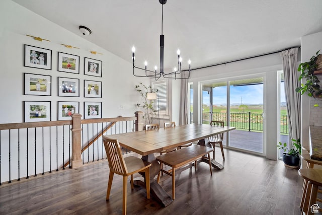 9457 N 4800 W, Elwood, UT 84337 - dining area with vaulted ceiling, wood finished floors, and a chandelier