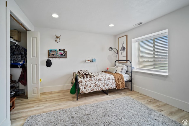 9457 N 4800 W, Elwood, UT 84337 - bedroom featuring wood finished floors, visible vents, recessed lighting, and baseboards