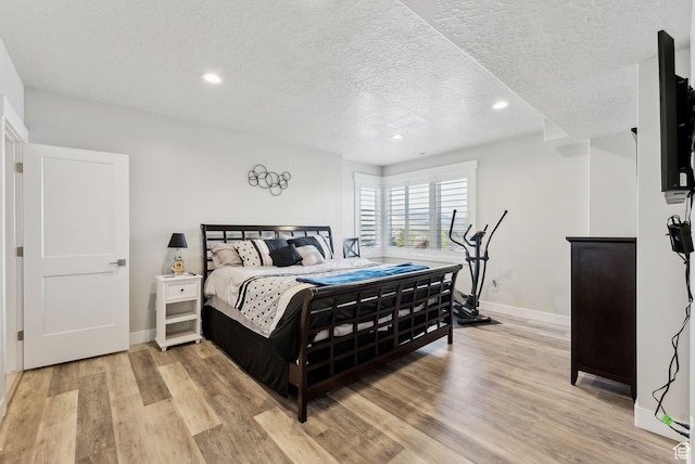 6593 W Bonnie Jean Ln Unit 13, Herriman, UT 84096 - bedroom with recessed lighting, a textured ceiling, and baseboards