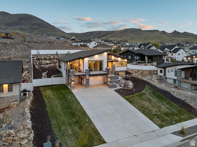 6593 W Bonnie Jean Ln Unit 13, Herriman, UT 84096 - exterior space featuring driveway, a balcony, a mountain view, fence, and a garage