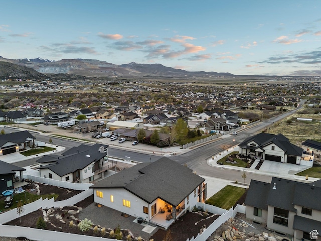 6593 W Bonnie Jean Ln Unit 13, Herriman, UT 84096 - aerial view at dusk featuring a mountain view and a residential view