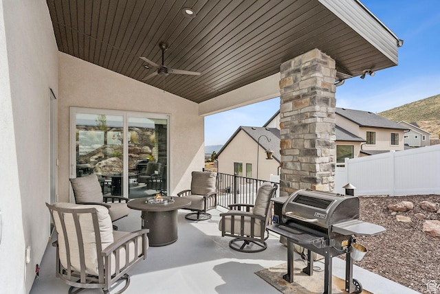 6593 W Bonnie Jean Ln Unit 13, Herriman, UT 84096 - view of patio featuring a grill, fence, and a ceiling fan