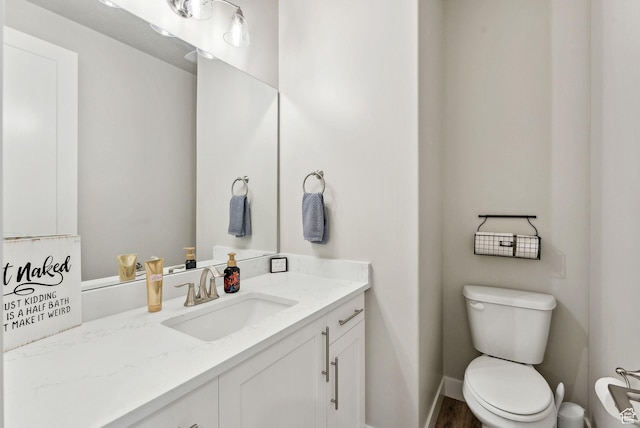 6593 W Bonnie Jean Ln Unit 13, Herriman, UT 84096 - bathroom with baseboards, toilet, and vanity
