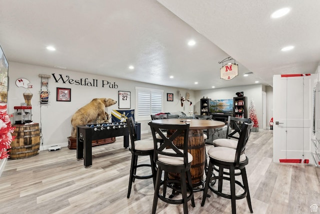 6593 W Bonnie Jean Ln Unit 13, Herriman, UT 84096 - dining area with recessed lighting, light wood finished floors, and baseboards