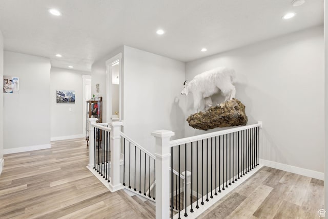 6593 W Bonnie Jean Ln Unit 13, Herriman, UT 84096 - corridor featuring an upstairs landing, wood finished floors, recessed lighting, and baseboards