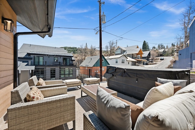88 King Rd, Park City, UT 84060 - exterior space with a hot tub, a residential view, an outdoor hangout area, and a balcony
