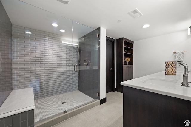 88 King Rd, Park City, UT 84060 - bathroom featuring visible vents, tile patterned flooring, a shower stall, vanity, and recessed lighting