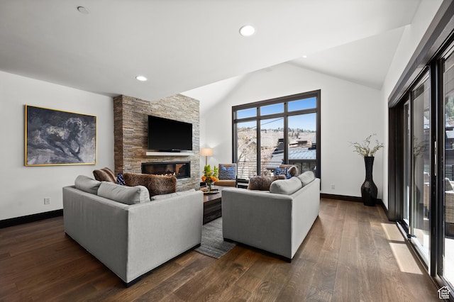 88 King Rd, Park City, UT 84060 - living area with baseboards, dark wood-style floors, a stone fireplace, and lofted ceiling