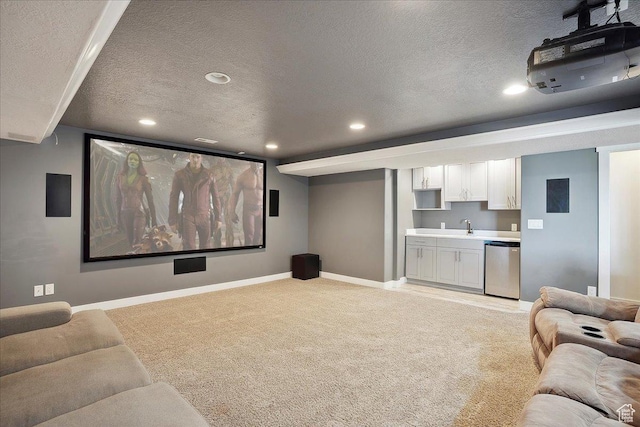 1380 Angel Crest Way, Kaysville, UT 84037 - home theater room with a textured ceiling, baseboards, recessed lighting, and light carpet