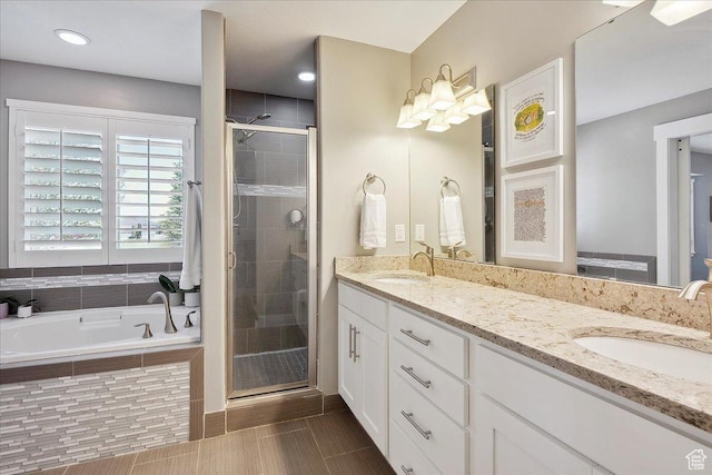 1380 Angel Crest Way, Kaysville, UT 84037 - full bathroom featuring double vanity, a garden tub, a stall shower, and a sink