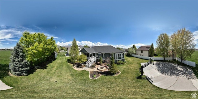 1380 Angel Crest Way, Kaysville, UT 84037 - rear view of house with a sunroom, fence, a yard, and stairs