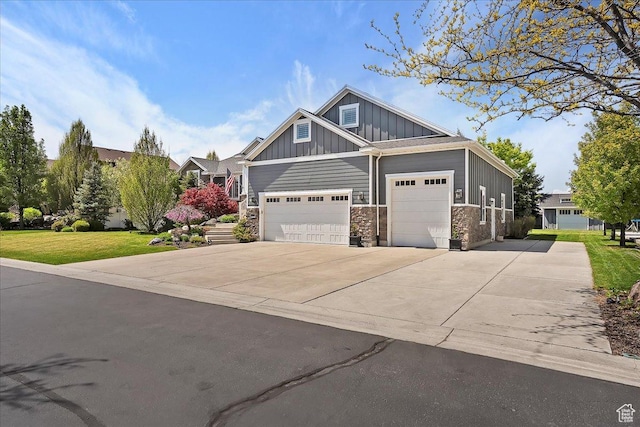1380 Angel Crest Way, Kaysville, UT 84037 - craftsman inspired home featuring board and batten siding, a garage, stone siding, a front yard, and concrete driveway